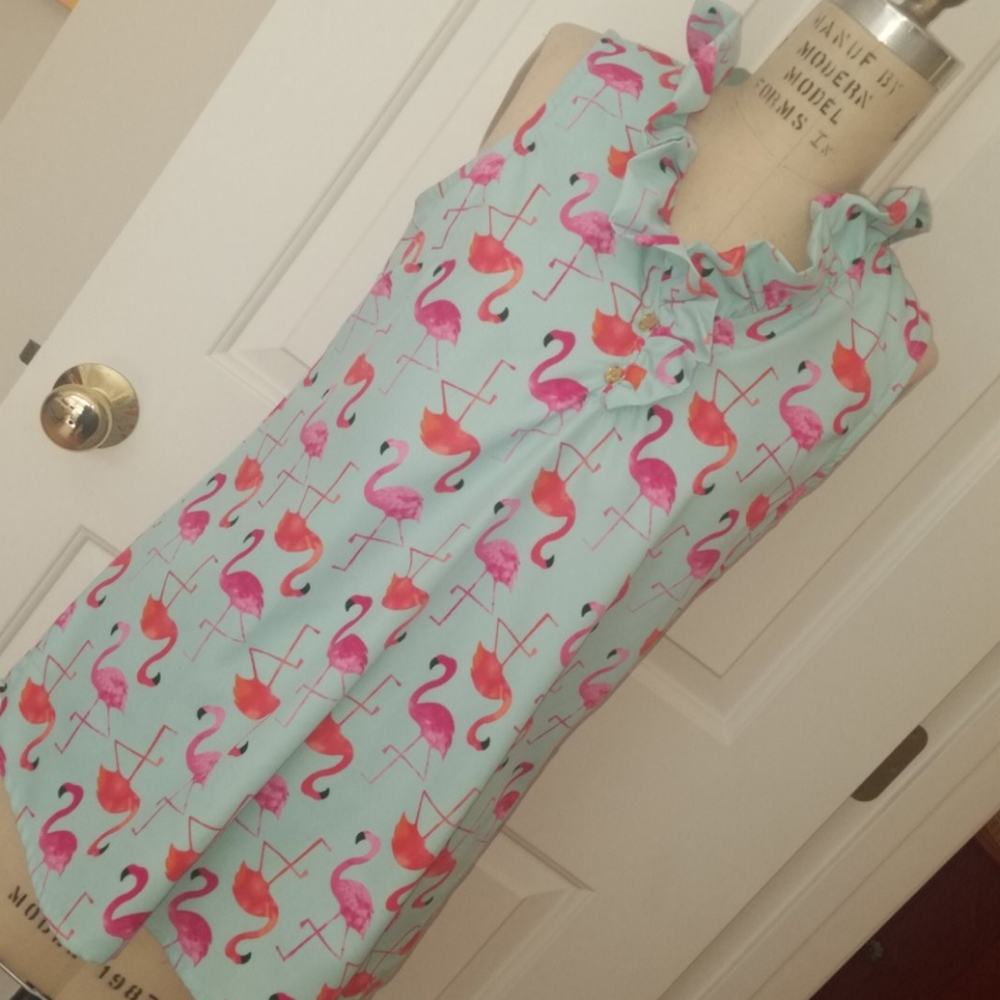 Aqua sleeveless top with flamingos